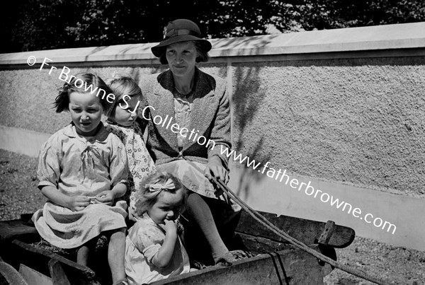 MRS KELLY AND CHILDREN IN CART